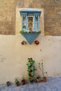 a religious icon on the wall in Valletta, Malta