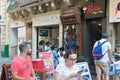 Valletta, Malta, August 2019. Diverse people in a street cafe in the city center.