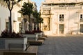 Valletta, Malta, August 2019. Part of the central square with a fountain and benches for vacationers.