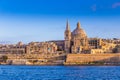 Valletta, Malta - The beautiful Saint Paul`s Cathedral and the ancient walls of Valletta in the morning