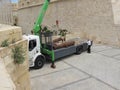 Workers loading old cannons on a truck for restoration at St Elm