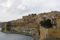 VALLETTA, MALTA - DEC 31st, 2019: Panoramic skyline view of the Grand Harbor of Valletta and Upper Barrakka Gardens at Royalty Free Stock Photo