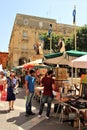 Valletta, Malta, July 2014. Lively movement of people on the main street of the city during a religious holiday.