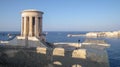 Siege Bell War Memorial and War siege Memorial near to Park Lower Barrakka Gardens in Valletta city, Malta Royalty Free Stock Photo