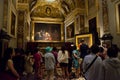 Tourists in the sacristy room inside the Valletta co-cathedral in Malta where the two paintings by Caravaggio are exhibited: the Royalty Free Stock Photo