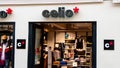 The Celio clothing fashion store with open door to interior with a logo of the luxury brand