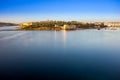 Valletta, Malta - Summer sunrise view with Manoel island, Valletta and Sliema with sailing boats