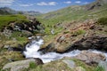 The valley Aigle Blanche close to Saint Veran viewed from the path leading to Refuge de la Blanche, with a torrent