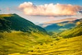 Valley along the mountain peaks crossed by Transalpina road Royalty Free Stock Photo