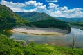 Valley of Arda river near Madzarovo, Bulgaria, Eastern Rhodopes. Summer day in Bulgaria. River Landscape with green hills. Traveli