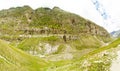 The valley of the Chenab River in the Himalayas. A mountains overgrown with forests, along which streams flow down