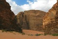 valley and desert landscape in middle east with vans while transporting people Royalty Free Stock Photo