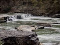 Valley Falls State Park near Fairmont West Virginia in the spring with the multiple waterfalls with cascading water flowing hard Royalty Free Stock Photo