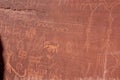 Valley of Fire - Close up view of Native American rock art (Petroglyphs) on red Aztek sandstone wall of Atlatl rock, Nevada Royalty Free Stock Photo