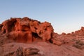 Valley of Fire - Panoramic sunrise view of red and orange Aztec Sandstone Rock formations and desert vegetation, Nevada Royalty Free Stock Photo