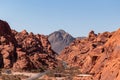 Valley of Fire - Panoramic view of endless winding empty Mouse tank road through canyons of red Aztec Sandstone Rock Royalty Free Stock Photo