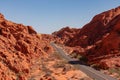 Valley of Fire - Panoramic view of endless winding empty Mouse tank road through canyons of red Aztec Sandstone Rock Royalty Free Stock Photo