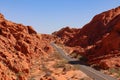 Valley of Fire - Panoramic view of endless winding empty Mouse tank road through canyons of red Aztec Sandstone Rock Royalty Free Stock Photo