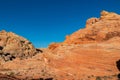 Valley of Fire - Panoramic view of red and orange Aztec Sandstone Rock formations and desert vegetation, Nevada Royalty Free Stock Photo