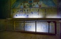 Valley of the Kings, Egypt. February 18, 2017: Interior of an Egyptian tomb with polychrome walls full of hieroglyphs and little