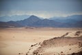 Valley in the Sinai desert with sand dunes and mountains