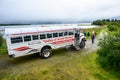 Valley of Ten Thousand Smokes tour bus with people waiting to load up