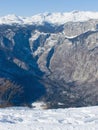 Valley under snowy alpine peaks