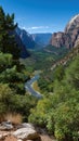 Valley View with a Flowing River and Towering Cliffs under a Clear Blue Sky in a Natural Landscape Setting Royalty Free Stock Photo