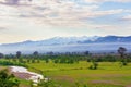 Valley view with river and mountains in the background at sunrise Royalty Free Stock Photo