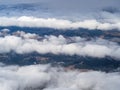 Valley viewed through the separation in the clouds