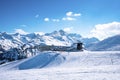 Valluga ski station with tourists at snowy mountain range in alps