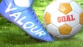 Valour and a life goal - pictured as word Valour on a football shoe to symbolize that Valour can impact a goal and is a factor in Royalty Free Stock Photo