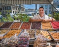 VALPARAISO, CHILE - Nov 19 - Happy vendor selling sweets on the streets of Valparaiso in Chile on Nov 19, 2014