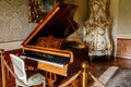 Valtice, Southern Moravia, Czech Republic, 04 July 2021: Castle interior, baroque wooden carved furniture, music room with antique