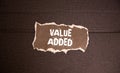 VALUE ADDE text on a clipboard on white background Royalty Free Stock Photo