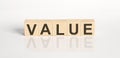 VALUE word from wooden blocks on the white desk Royalty Free Stock Photo