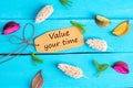 Value your time text on paper tag