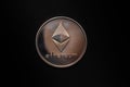 valueable shining gold silver ether coin from cryptocurrency middle on black