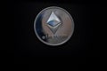 valueable silver ether coin from cryptocurrency middle top on black