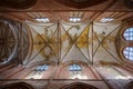 Valuted celling and brick walls with, windows, arches and pillars inside the St. Georgen Church in the old town of Wismar, a