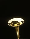 VALVE TROMBONE AGAINST BLACK BACKGROUND Royalty Free Stock Photo