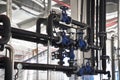 Valves in a factory where the pressure system is controlled Royalty Free Stock Photo