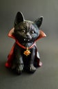 A vampire black cat with a cape Royalty Free Stock Photo