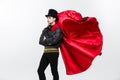 Vampire Halloween Concept - Portrait of handsome caucasian Vampire halloween costume fluttering his red, black cloak. Royalty Free Stock Photo