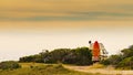 Van camper with surf board camp on beach Royalty Free Stock Photo