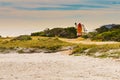 Van camper with surf board camp on beach Royalty Free Stock Photo