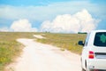 Van on the dirt serpantine road Royalty Free Stock Photo