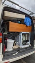 A van filled to the roof with household clearance waste