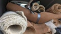 A van full of house clearance carpet rolls underlay and vinyl flooring