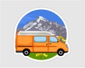 Van Life sticker. Orange van with forest and mountains in the background. Living van life, camping in the nature, travelling.